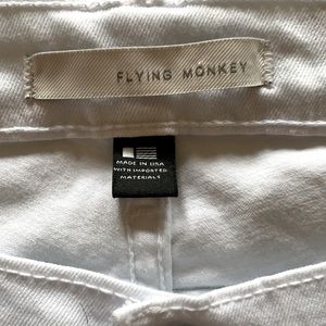Flying Monkey off white skinny jeans.